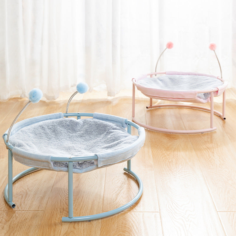 Pet bed with stand on a wooden floor