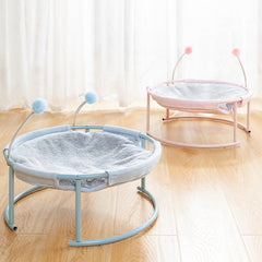 Pet bed with stand on a wooden floor