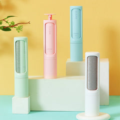 Four cylindrical cleaning products in pastel colors on a geometric platform with a yellow and blue gradient background.