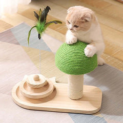 Cat playing with a green and wooden cat toy on a wooden floor.
