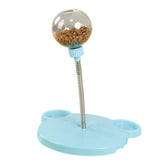 Pet toy with a transparent ball containing treats on a white background