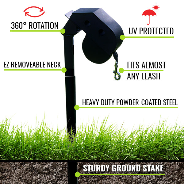 Black dog leash holder with grass and ground stake at the bottom