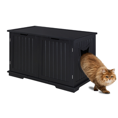 Black pet crate with a cat peeking out on a white background